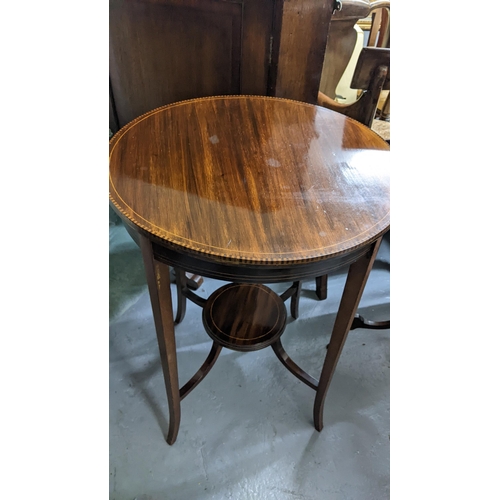 406 - Two Edwardian mahogany circular topped occasional tables on splayed legs
Location:G
If there is no c... 