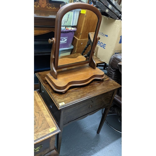 409 - A Victorian mahogany Duchess dressing table mirror together with an oak cabinet
Location:G
If there ... 