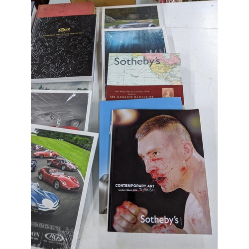 328 - Auction catalogues from RM auctions, Sotheby's, some still sealed, mainly relating to classic vehicl... 