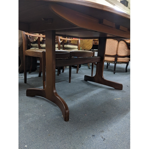 330 - A G plan teak oval draw leaf dining table and a set of six G plan dining chairs (table 206cm extende... 