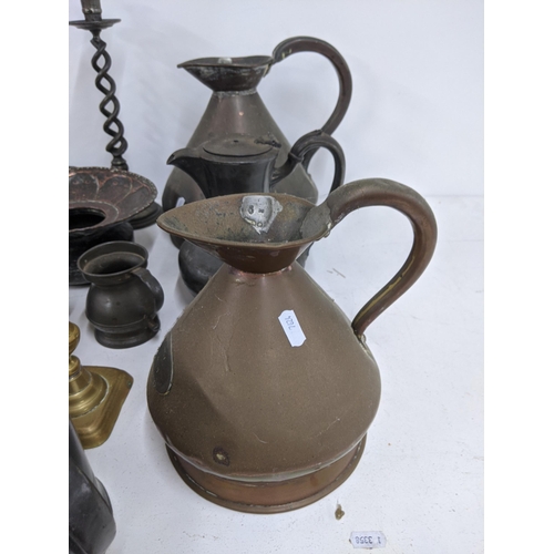 338 - Mixed metalware and pewter to include' jugs, candlesticks, tankards and other items
Location A4M
If ... 