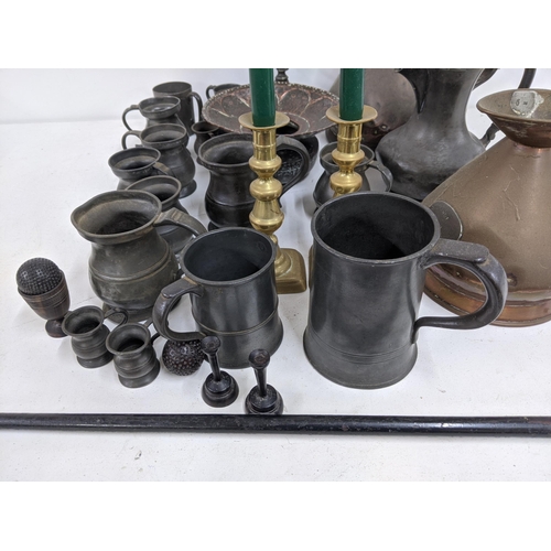 338 - Mixed metalware and pewter to include' jugs, candlesticks, tankards and other items
Location A4M
If ... 