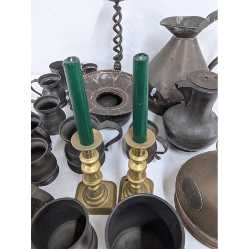 338 - Mixed metalware and pewter to include' jugs, candlesticks, tankards and other items
Location A4M
If ... 