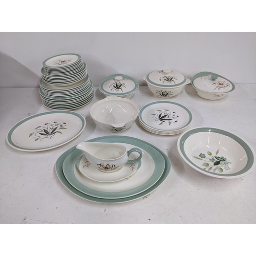 339 - A Wedgwood part dinner service ' Tiger Lily' along with a part Alfred Meakin dinner service 'Hedgero... 