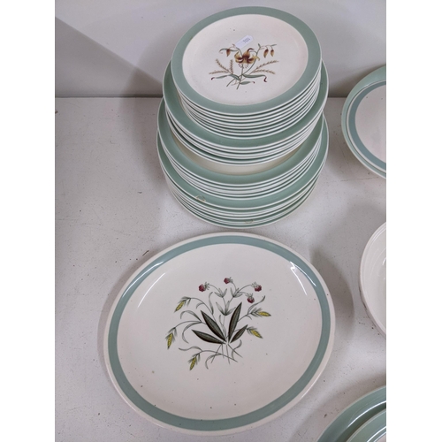 339 - A Wedgwood part dinner service ' Tiger Lily' along with a part Alfred Meakin dinner service 'Hedgero... 