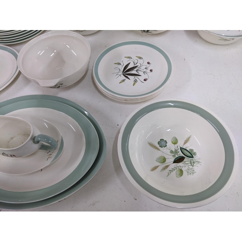 339 - A Wedgwood part dinner service ' Tiger Lily' along with a part Alfred Meakin dinner service 'Hedgero... 