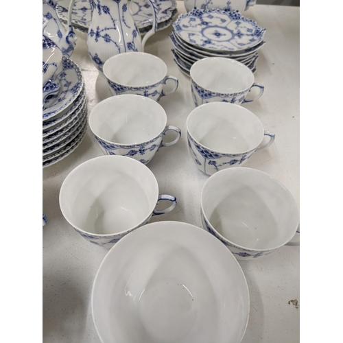 341 - A Royal Copenhagen part dinner service to include a teapot, milk jug, eight cups, two dinner plates ... 