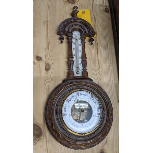 225 - Two late 19th/early 20th century American mantel clocks, together with a Moore & Co Dublin barometer... 