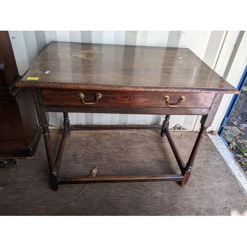 378 - A George II oak side table with a carved edge and a long drawer, on turned block legs, 70cm h x 86cm... 