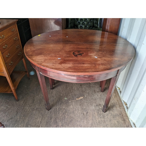 380 - A George III mahogany D end dining table, on square tapered legs, 70cm h x 120cm w
Location:BB
If th... 