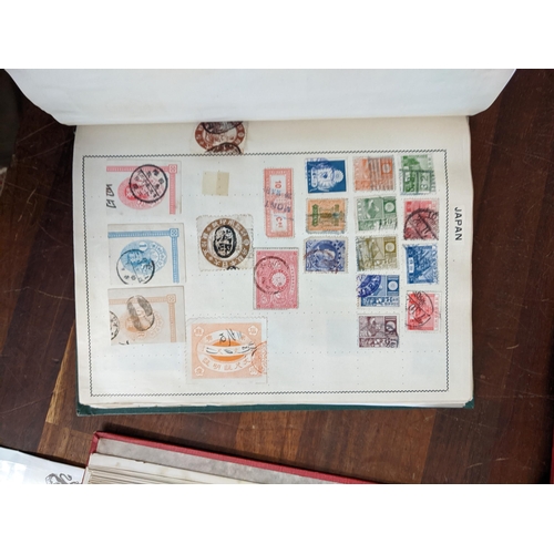 385 - Postage stamps form around the word in five albums to include British Penny Blacks, Chinese, America... 