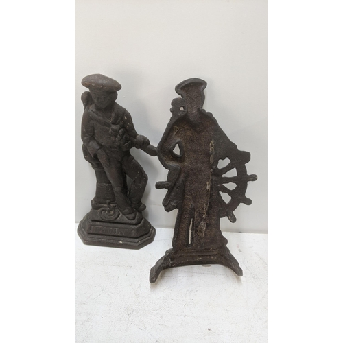 433 - A pair of Victorian cast iron door stops fashioned as sabres Location:RAB
If there is no condition r... 