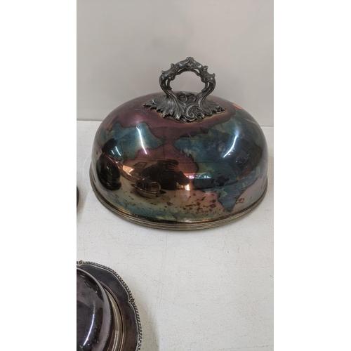 438 - Late 19th/early 20th century silver plate to include two meat covers and a butter dish Location:LWB
... 