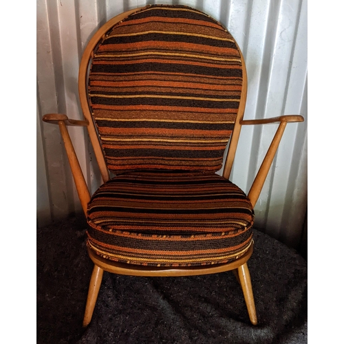 521 - A mid 20th century Ercol light elm and beech armchair Location:RC
If there is no condition report sh... 