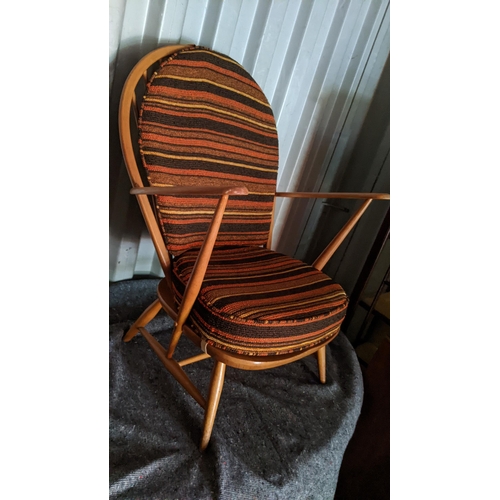 521 - A mid 20th century Ercol light elm and beech armchair Location:RC
If there is no condition report sh... 