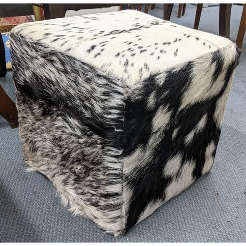 525 - A cowhide upholstered cube formed footstool 39.5cm h x 39.5cm w Location:RAM
If there is no conditio... 