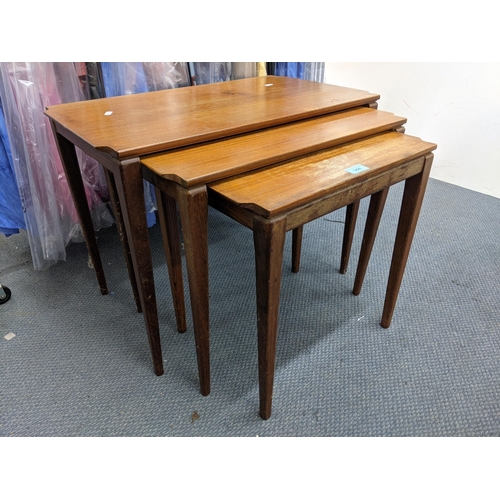 387 - A mid 20th century teak nesting set of tables
Location: RWB
If there is no condition report shown, p... 