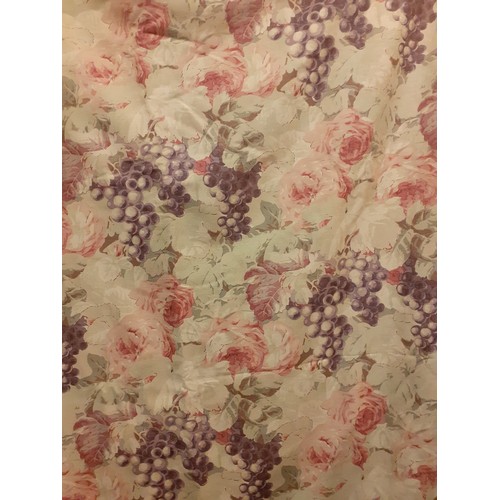 158 - A pair of late 20th Century beige curtains with grapevine and rose design having a tab top heading a... 