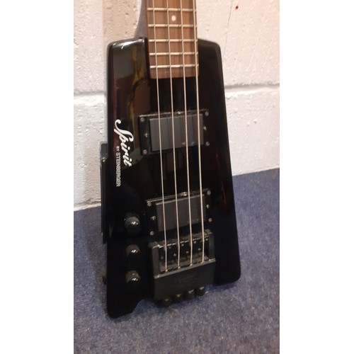 171 - A Steiberger Synapse Spirit guitar, left handed in black with padded soft case and accessories. Loca... 