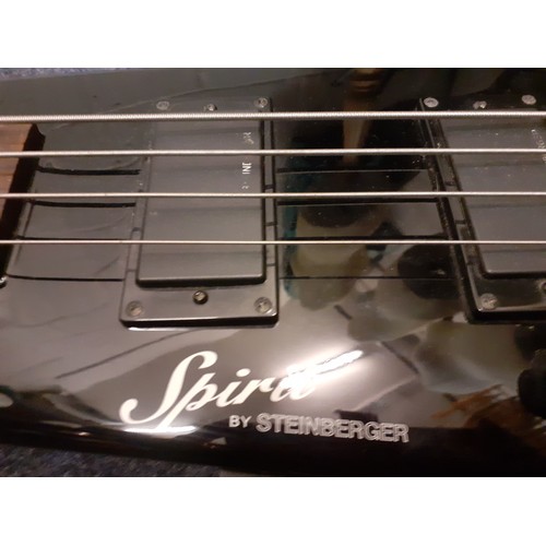 171 - A Steiberger Synapse Spirit guitar, left handed in black with padded soft case and accessories. Loca... 