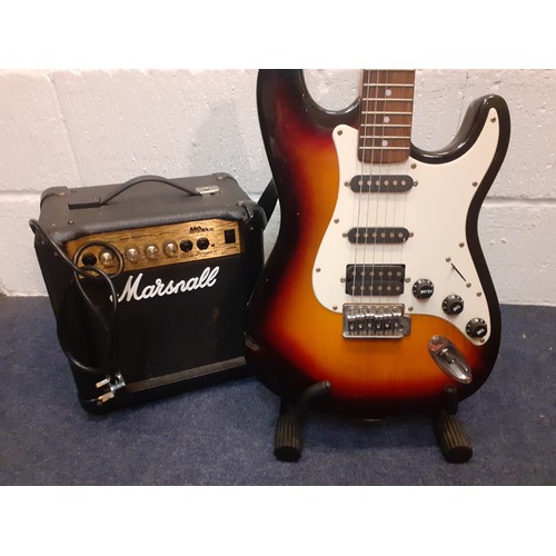 172 - A GR Tomcat electric guitar with folding stand, a Marshall MG10CD Series amp with cable and a guitar... 