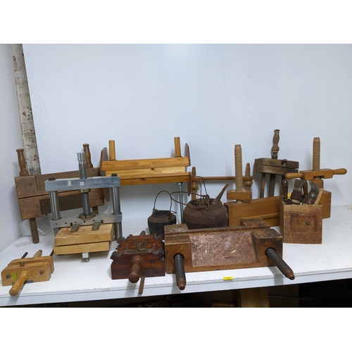 473 - A quantity of Victorian and later bookbinders ploughs, book press, glue pots, brushes and other item... 