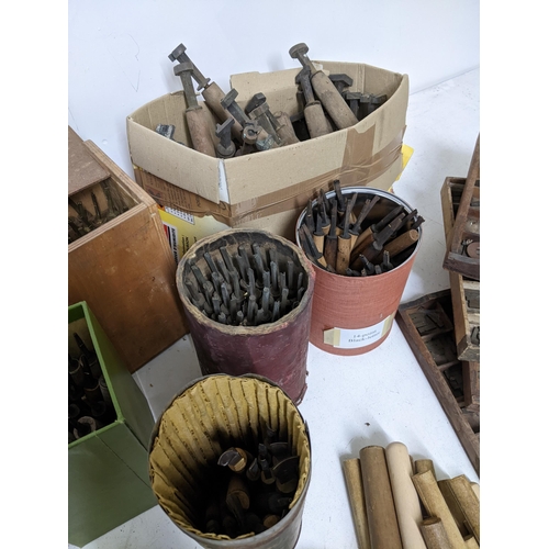 474 - A good quantity of bookbinders and printers tools, letters and other accessories to include 22 carat... 