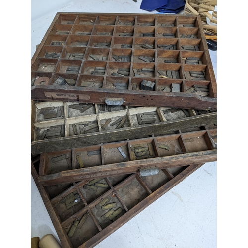 474 - A good quantity of bookbinders and printers tools, letters and other accessories to include 22 carat... 