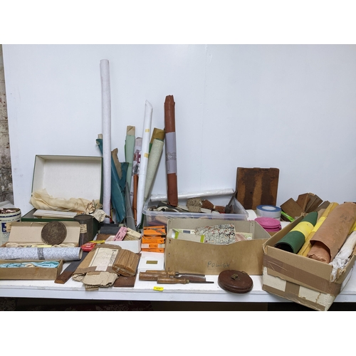 475 - A selection of bookbinders materials and accessories to include book, cloths, stain cords, headbands... 