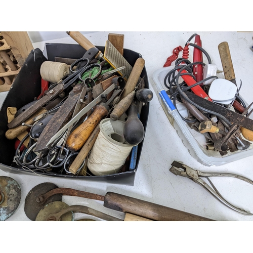 476 - A selection of bookbinders/printers tools, letter stamps and accessories tools, along with a paper c... 