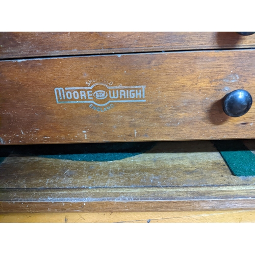 563 - A Moore & Wright engineer's teak tool chest, fall flap (with key), interior with six short and two l... 