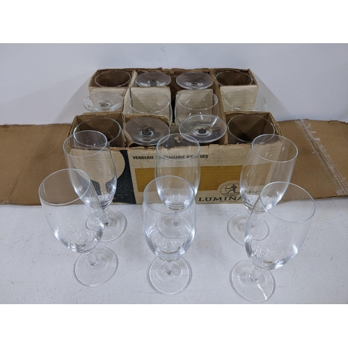 507 - Mixed and boxed unused French Luminarc glasses to include six champagne glasses
Location:8.1
If ther... 