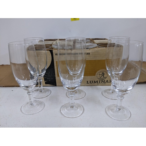 507 - Mixed and boxed unused French Luminarc glasses to include six champagne glasses
Location:8.1
If ther... 