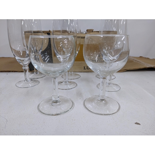 507 - Mixed and boxed unused French Luminarc glasses to include six champagne glasses
Location:8.1
If ther... 