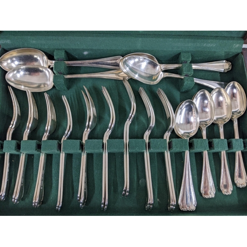 511 - A Mappin & Webb canteen of cutlery (not complete) together with an oval shaped silver plated hinged ... 