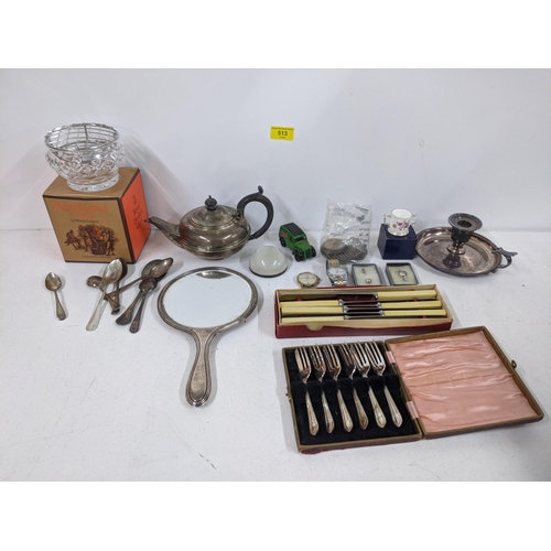 513 - A mixed lot to include silver plated spoons, teapot, mirror, cake forks and knives, together with tw... 