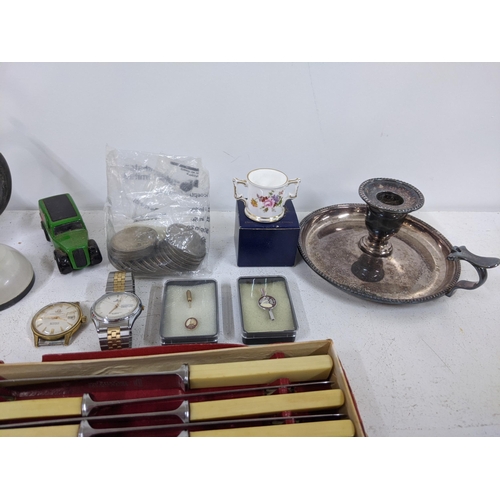 513 - A mixed lot to include silver plated spoons, teapot, mirror, cake forks and knives, together with tw... 