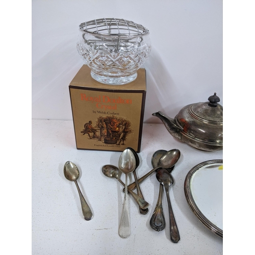 513 - A mixed lot to include silver plated spoons, teapot, mirror, cake forks and knives, together with tw... 