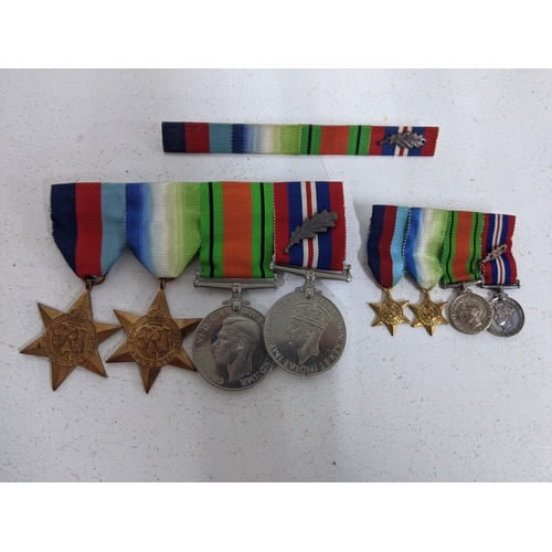 515 - WW2 medals to include the 1939-1945 Star, the Atlantic Star, the Defence Medal, and the Victory Meda... 