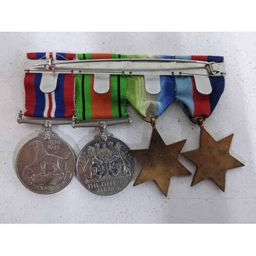 515 - WW2 medals to include the 1939-1945 Star, the Atlantic Star, the Defence Medal, and the Victory Meda... 