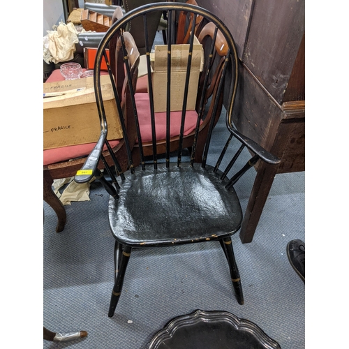 561 - An American black painted Windsor style armchair Location:A3F
If there is no condition report shown,... 