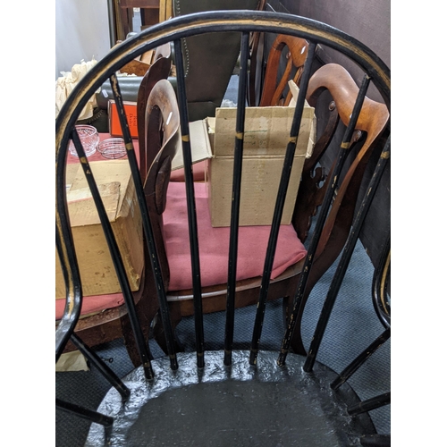 561 - An American black painted Windsor style armchair Location:A3F
If there is no condition report shown,... 