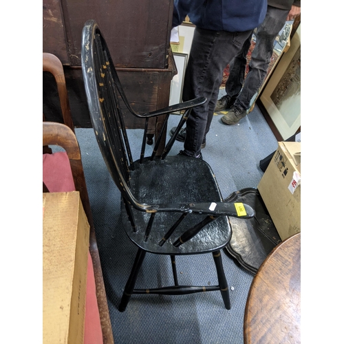 561 - An American black painted Windsor style armchair Location:A3F
If there is no condition report shown,... 