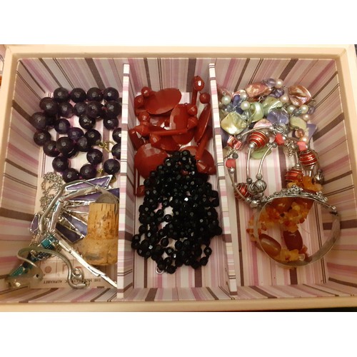 54 - Three cream Stackers jewellery compartmental boxes and contents to include vintage bead necklaces, a... 