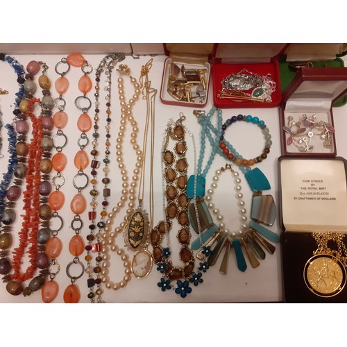 54 - Three cream Stackers jewellery compartmental boxes and contents to include vintage bead necklaces, a... 