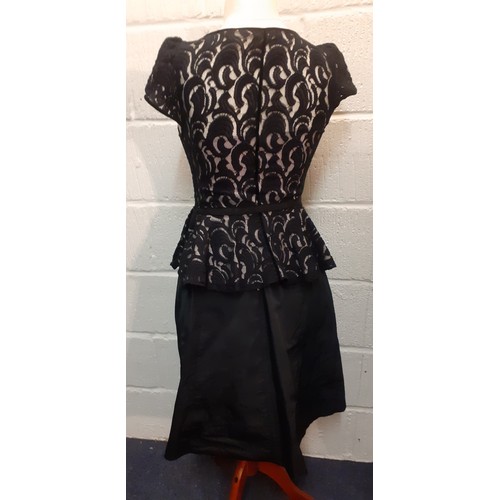 25 - Karen Millen and Von Furstenburg- A Karen Millen black taffeta knee length skirt UK10, a black lace ... 