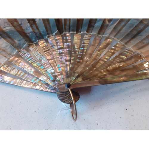 21 - A late 19th Century Houghton fan having 18 mother of pearl guards and sticks signed F.Houghton (Fran... 