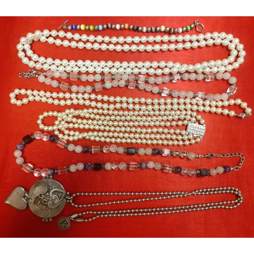 28 - A quantity of costume jewellery to include a Swarovski silver tone and large faceted white crystal r... 