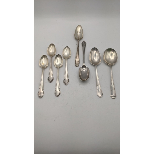 100 - A group of eight silver spoons to include a set of four teaspoons, hallmarked Birmingham 1913 and ot... 