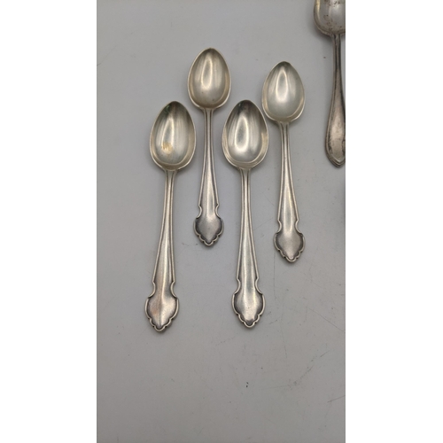 100 - A group of eight silver spoons to include a set of four teaspoons, hallmarked Birmingham 1913 and ot... 